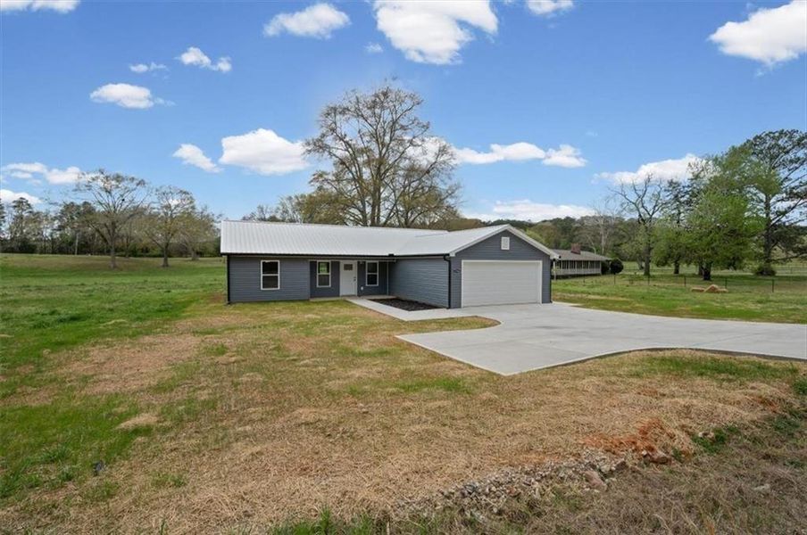 Front exterior of a new home in , Rome, GA, highlighting curb appeal (Image 18). Front exterior of a new home in , Rome, GA, highlighting curb appeal (Image 18).