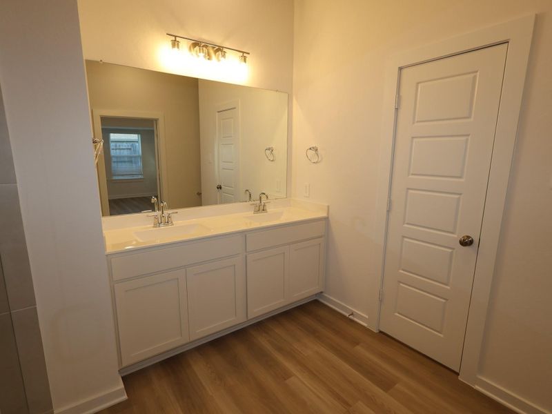 Furnished interior view inside a new home in Pinewood at Grand Texas, New Caney (Image 11).