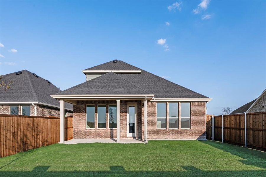 Exterior details and patio area of a home in Arbors at Legacy Hills, Celina (Image 3). Exterior details and patio area of a home in Arbors at Legacy Hills, Celina (Image 3).