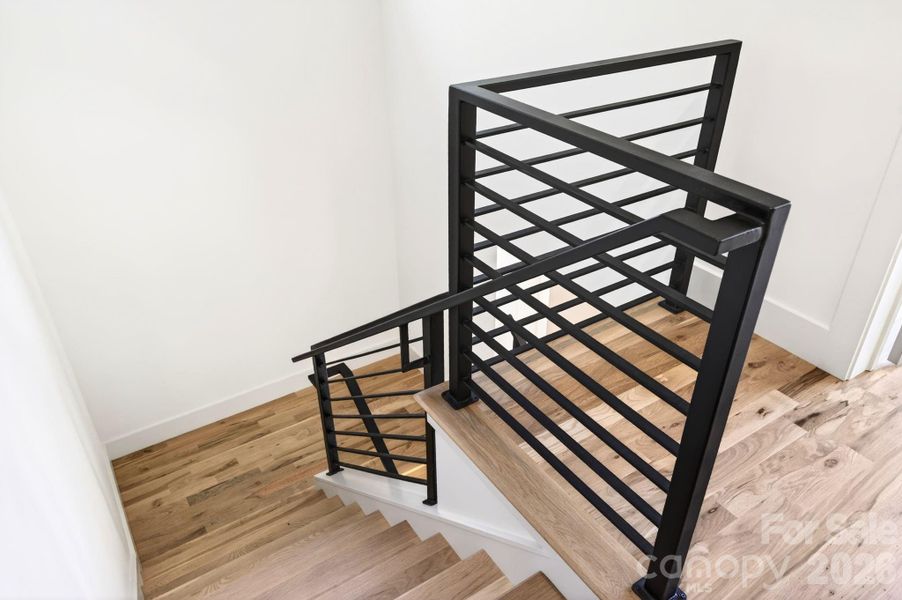 Elegant White Oak Floors/Stairs and Custom Handrails