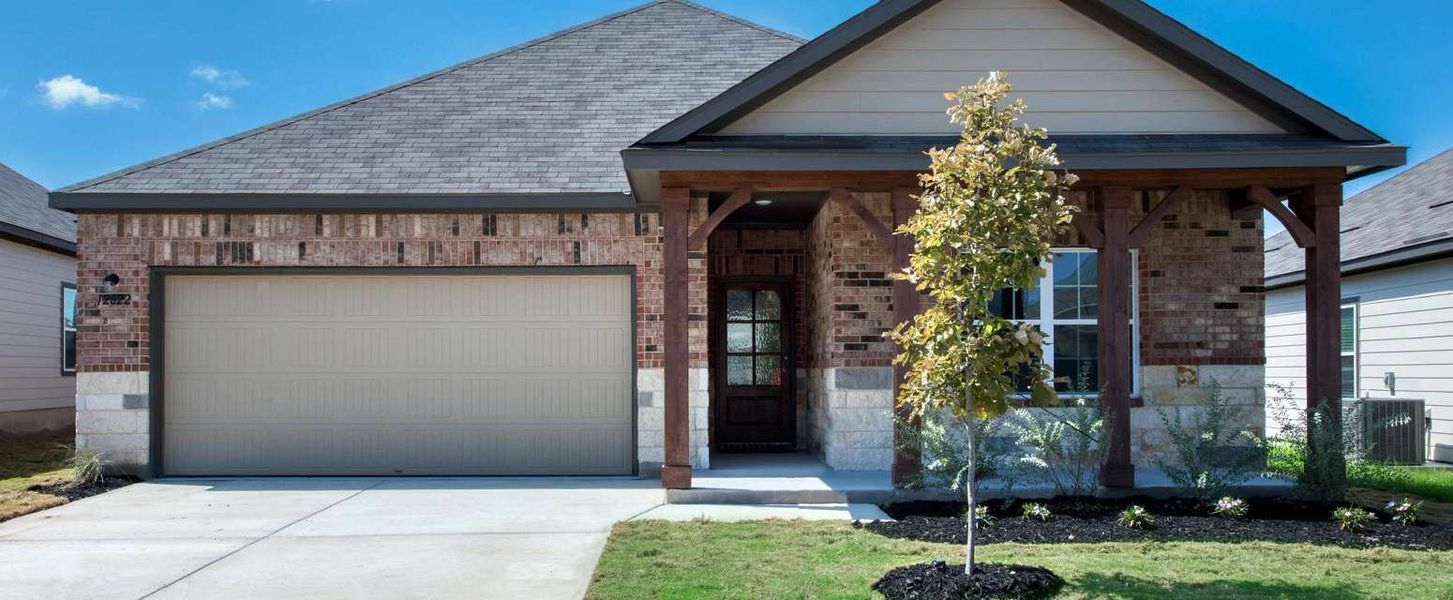 Representative exterior photo of a completed home built from the Carter by Ashton Woods in Cordova Trails, Seguin, TX (Image 1). Representative exterior photo of a completed home built from the Carter by Ashton Woods in Cordova Trails, Seguin, TX (Image 1).