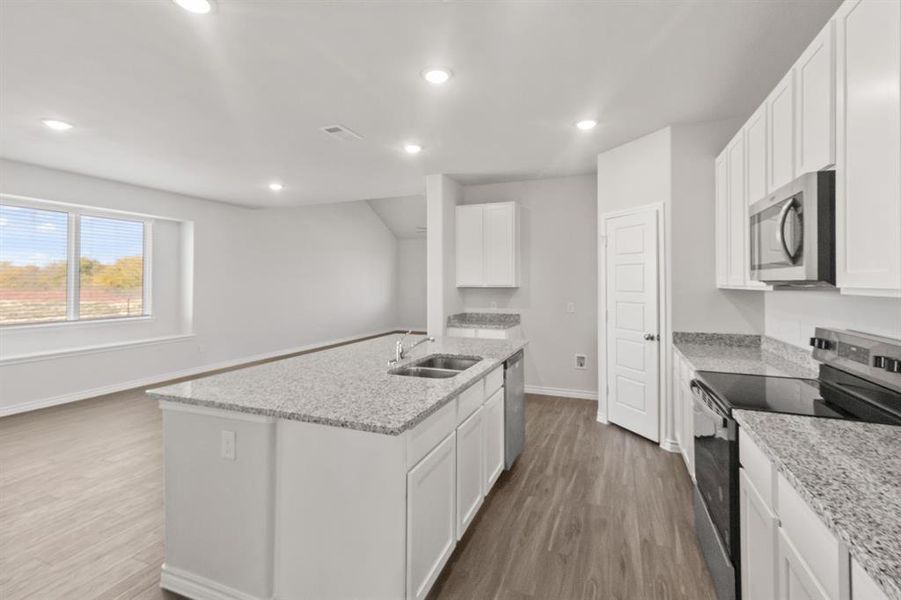 Furnished interior view inside a new home in Retreat at Fossil Creek, Fort Worth (Image 8). Furnished interior view inside a new home in Retreat at Fossil Creek, Fort Worth (Image 8).