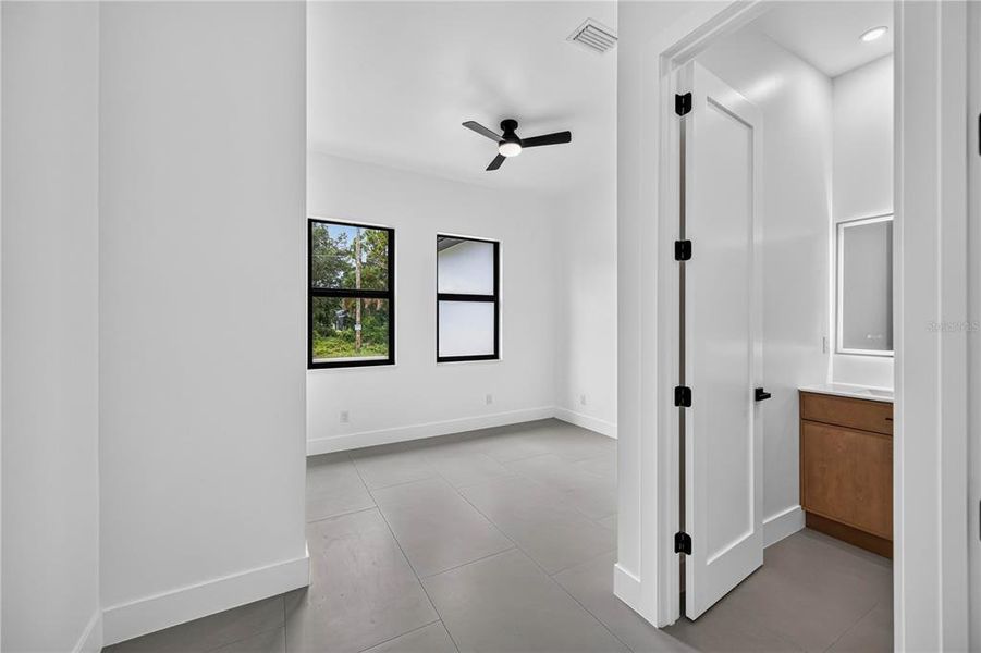 Spacious, unfurnished interior of a new home in , Port Charlotte (Image 22).