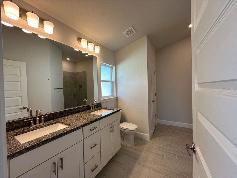 Furnished interior view inside a new home in Densan Park, Wildwood (Image 7).