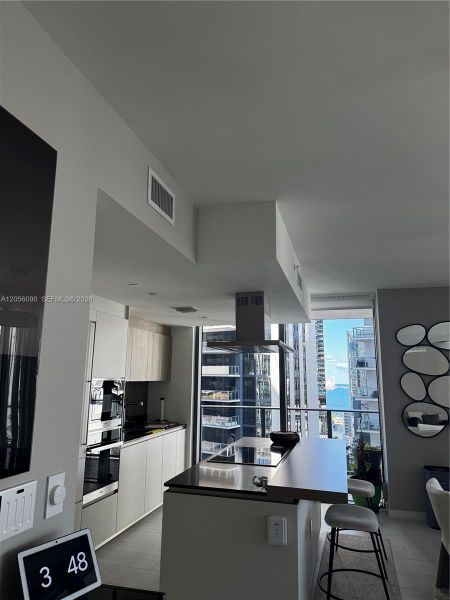 Furnished interior view inside a new home in , Miami (Image 16). Furnished interior view inside a new home in , Miami (Image 16).