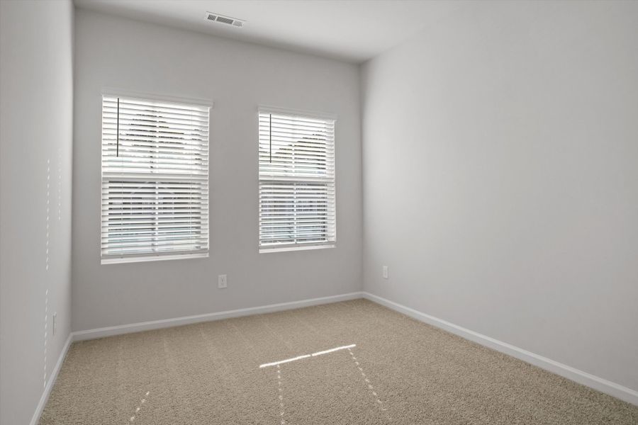 Spacious, unfurnished interior of a new home in West Main Townhomes, Sanford (Image 24).