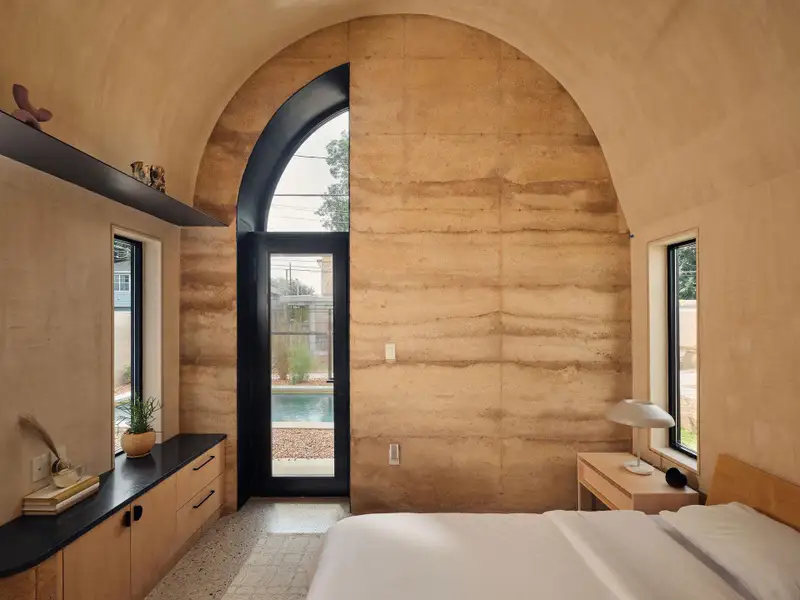 Bedroom with multiple windows