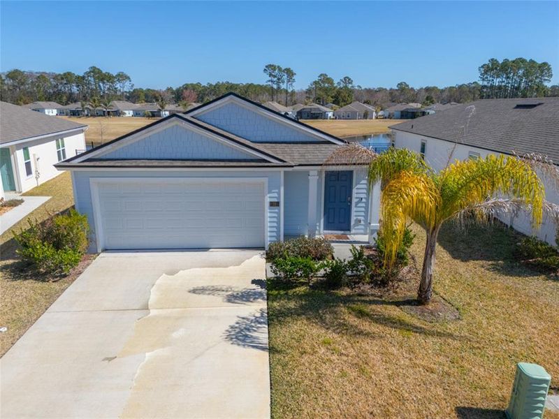 Front exterior of a new home in , Bunnell, FL, highlighting curb appeal (Image 19). Front exterior of a new home in , Bunnell, FL, highlighting curb appeal (Image 19).