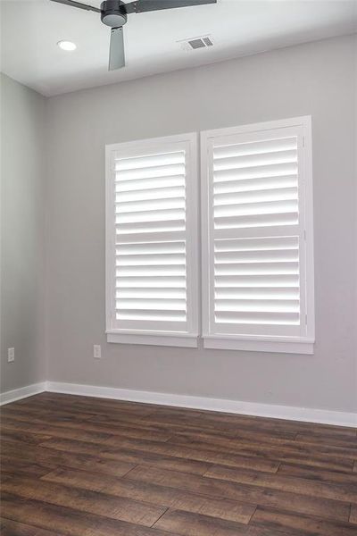 Empty room featuring wood finished floors, recessed lighting, and ceiling fan Empty room featuring wood finished floors, recessed lighting, and ceiling fan