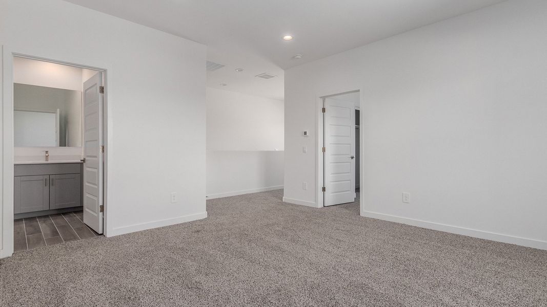 Representative unfurnished interior of a home built from the River by D.R. Horton in The Oasis at Rocking K, Vail (Image 40).