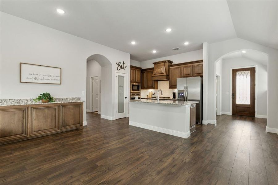 The dining area has a custom built in buffet for serving and additional storage.