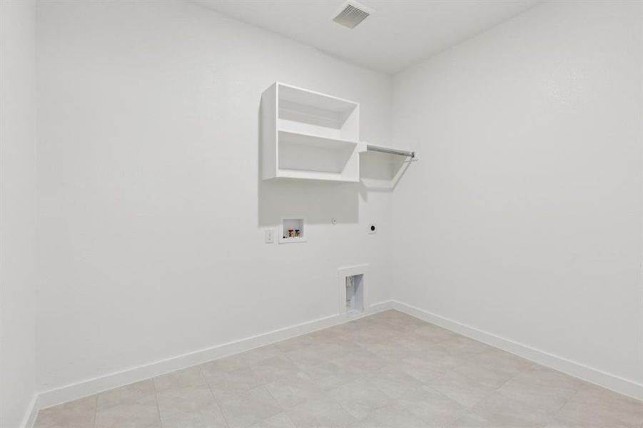 Utility in the Heisman home plan by Trophy Signature Homes – REPRESENTATIVE PHOTO