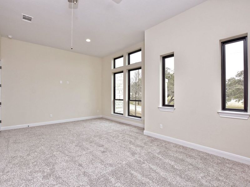 Representative unfurnished interior of a home built from the Avalon by Giddens Homes in Scofield Farms Estates, Georgetown (Image 152).