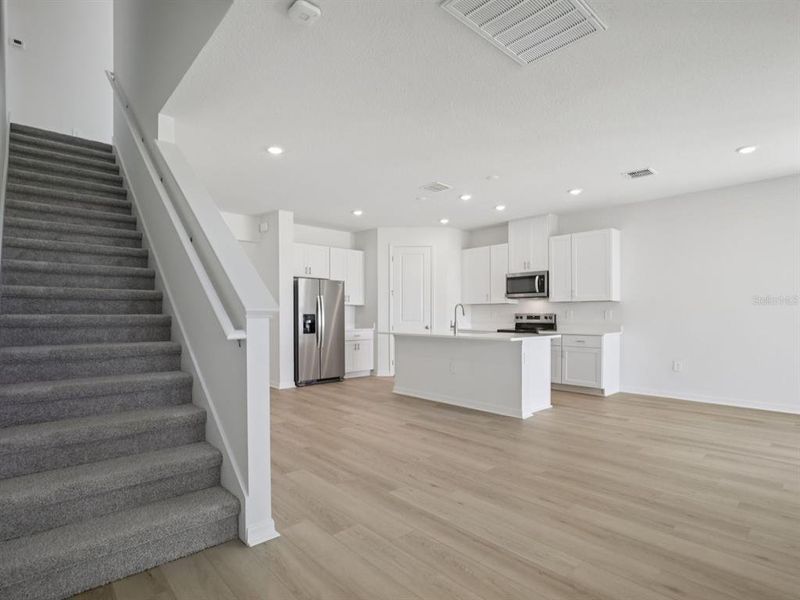 Spacious, unfurnished interior of a new home in Coasterra - Reserve Series, Palmetto (Image 38).