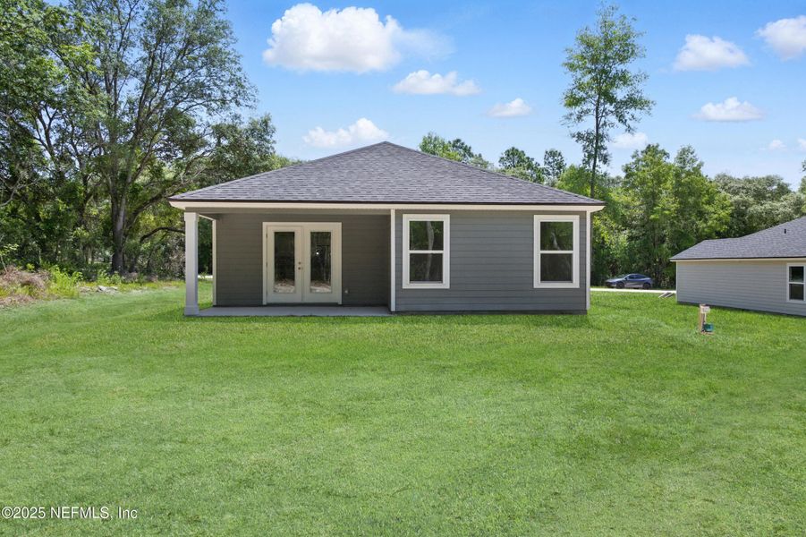 Front exterior of a new home in , Satsuma, FL, highlighting curb appeal (Image 24).