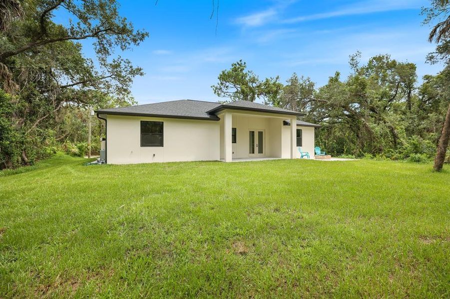 Exterior details and patio area of a home in , Port Charlotte (Image 23).