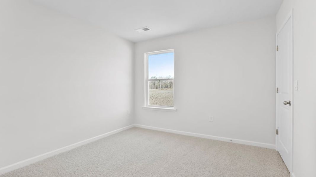 Spacious, unfurnished interior of a new home in Village Grove, Greenville (Image 29).