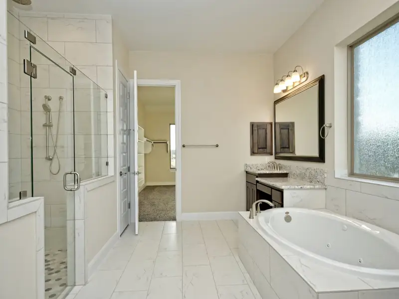 Representative furnished interior of a home built from the Santa Barbara II by Giddens Homes in Scofield Farms Estates, Georgetown (Image 17).