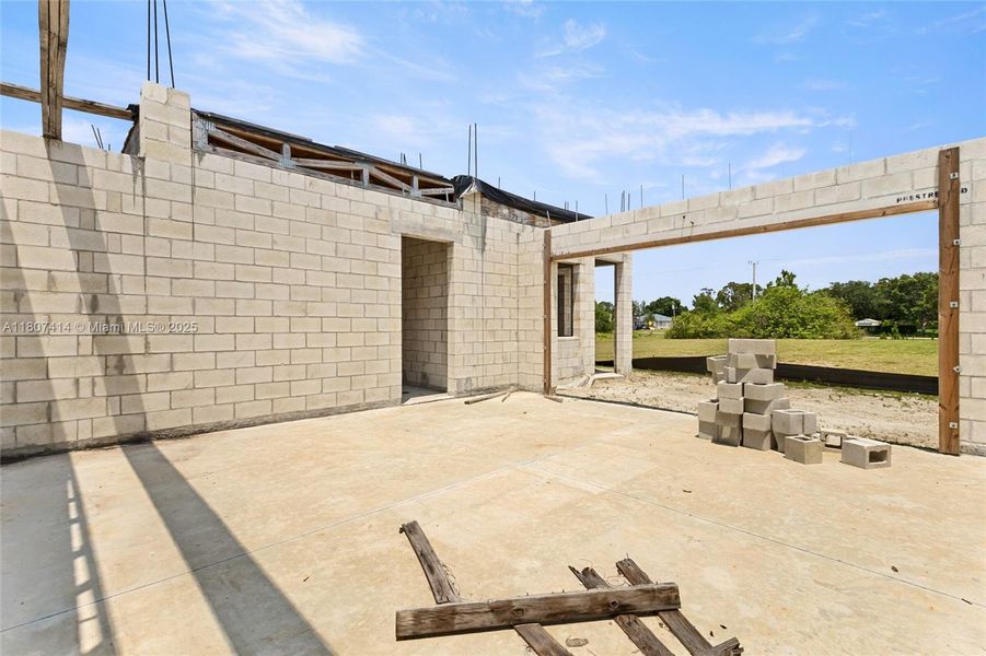 Front exterior of a new home in , Palm Bay, FL, highlighting curb appeal (Image 11).