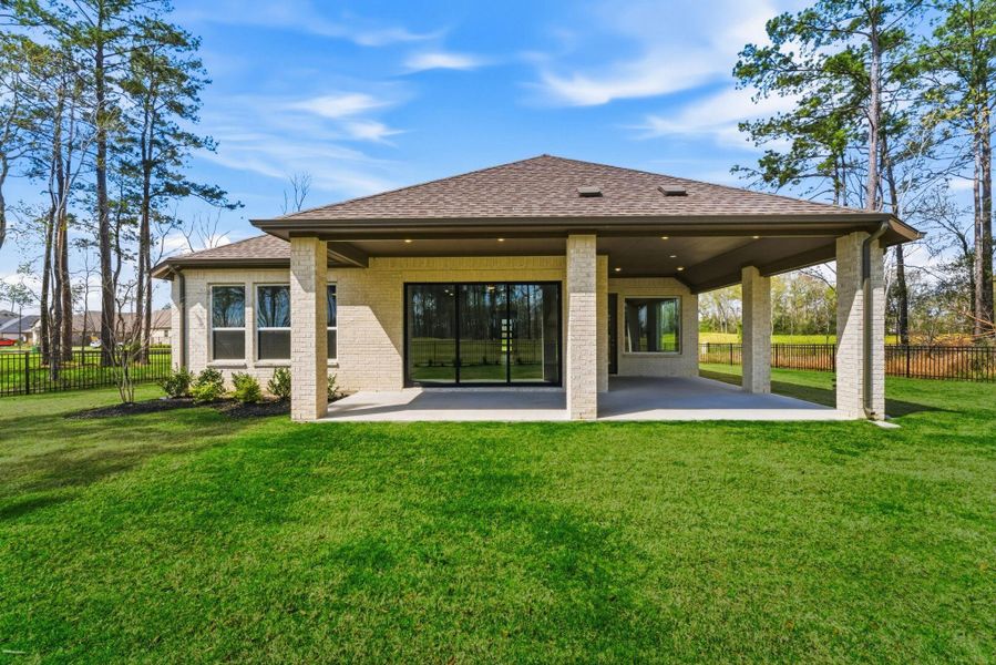 Exterior details and patio area of a home in The Highlands, Porter (Image 26).