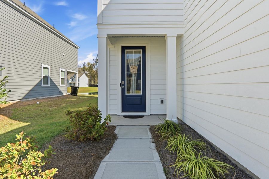 Exterior details and patio area of a home in Founders Corner, Lincolnville (Image 3).