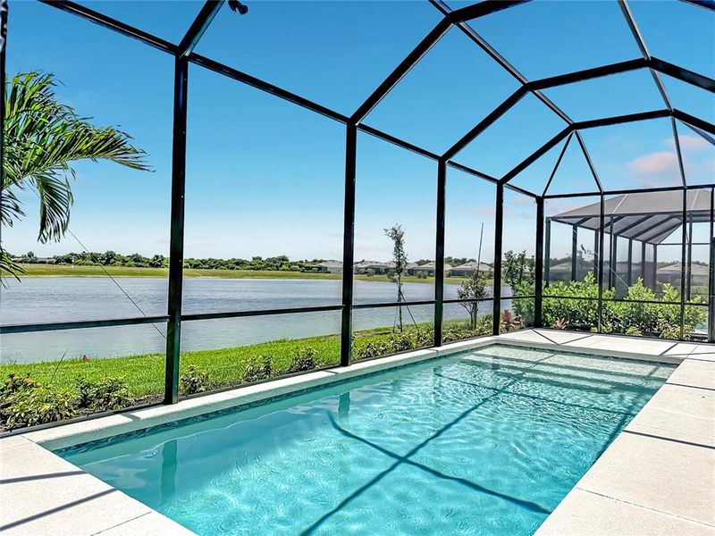 Exterior details and patio area of a home in Watercolor Place, Bradenton (Image 25).