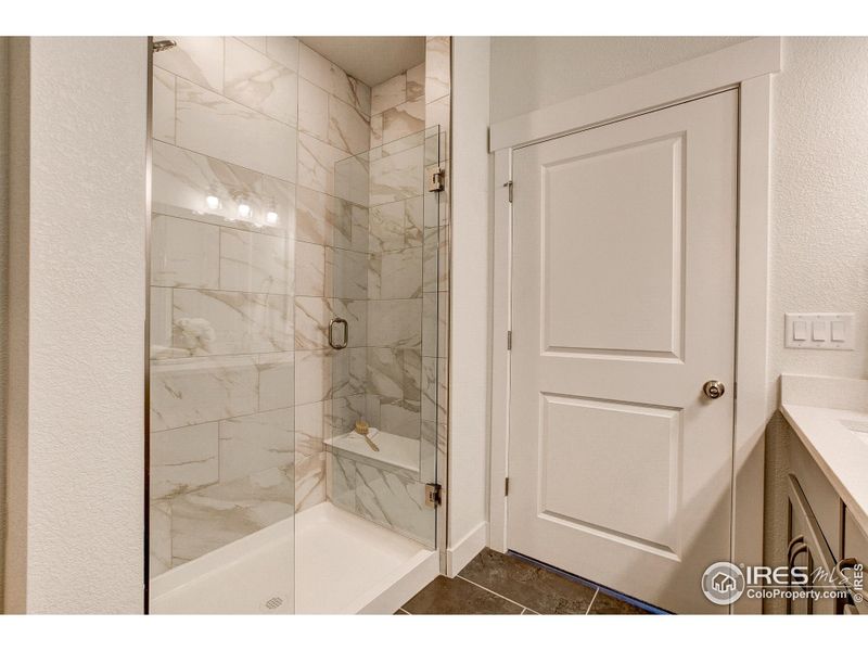 Gorgeous, oversized shower in primary bathroom