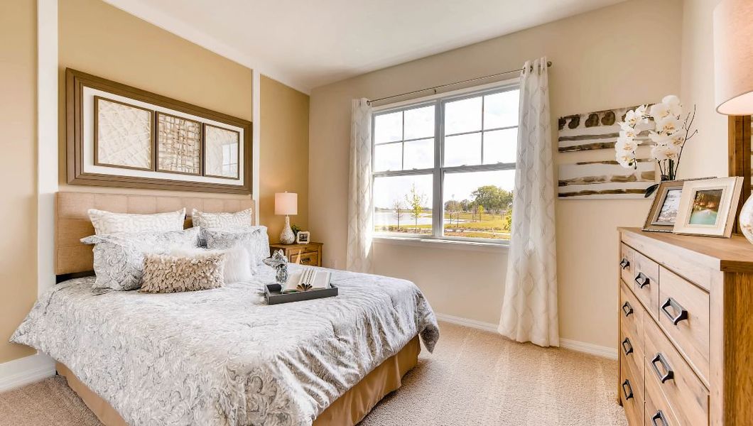 Furnished interior in a model home at Preserves at Lakeside Landings in Winter Haven (Image 26).