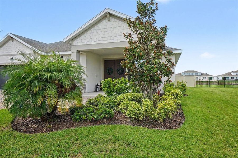 Exterior details and patio area of a home in Seaire, Parrish (Image 4).