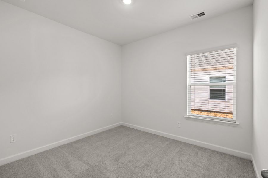 Spacious, unfurnished interior of a new home in Cypress Ridge - The Boardwalk Series, Longs (Image 17).