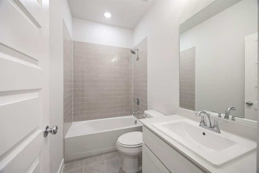 Bathroom in the Wimbledon home plan by Trophy Signature Homes – REPRESENTATIVE PHOTO Bathroom in the Wimbledon home plan by Trophy Signature Homes – REPRESENTATIVE PHOTO