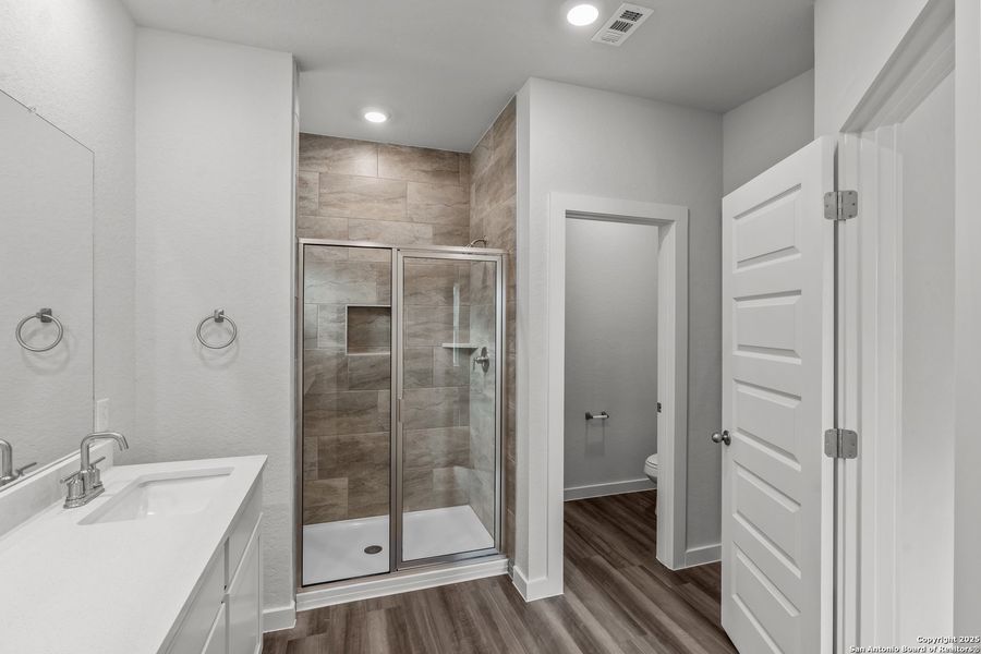 Furnished interior view inside a new home in August Fields, New Braunfels (Image 9).