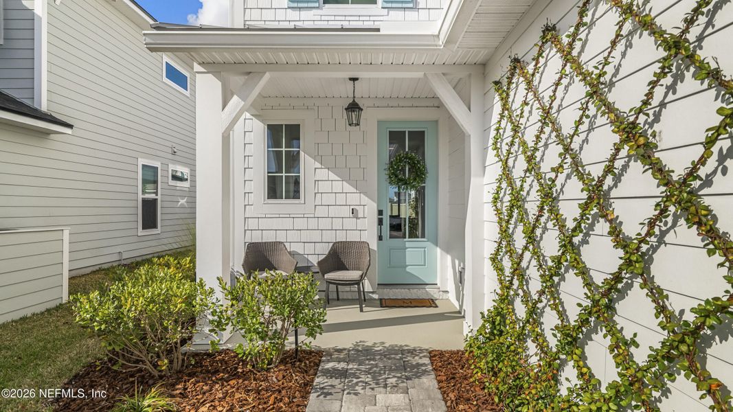 Exterior details and patio area of a home in Settler's Landing at Nocatee, Ponte Vedra (Image 4).