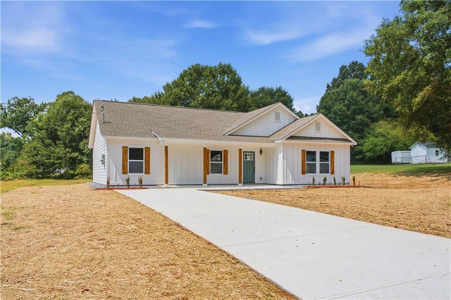 Front exterior of a new home in , Hiram, GA, highlighting curb appeal (Image 18).