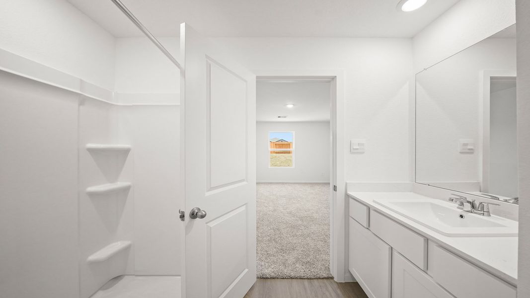 Furnished interior view inside a new home in Westward Pointe, Sealy (Image 9).