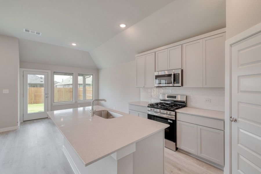 Furnished interior view inside a new home in Prairie Winds, Hutto (Image 9).