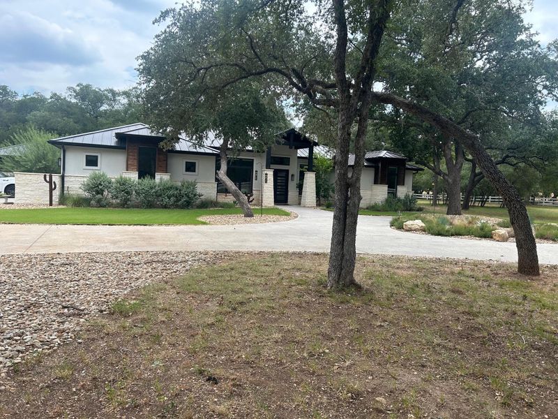 View of front of house featuring circular driveway View of front of house featuring circular driveway