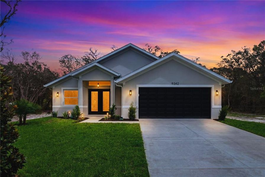 Front exterior of a new home in , Webster, FL, highlighting curb appeal (Image 25).