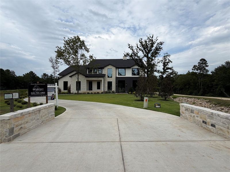 Front exterior of a new home in , Montgomery, TX, highlighting curb appeal (Image 2). Front exterior of a new home in , Montgomery, TX, highlighting curb appeal (Image 2).