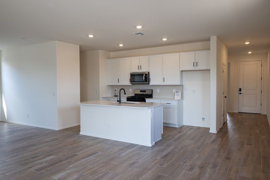 Furnished interior view inside a new home in The Legends at Gladden Farms, Marana (Image 3). Furnished interior view inside a new home in The Legends at Gladden Farms, Marana (Image 3).