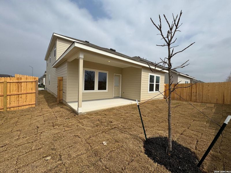 Exterior details and patio area of a home in Hennersby Hollow, San Antonio (Image 21).
