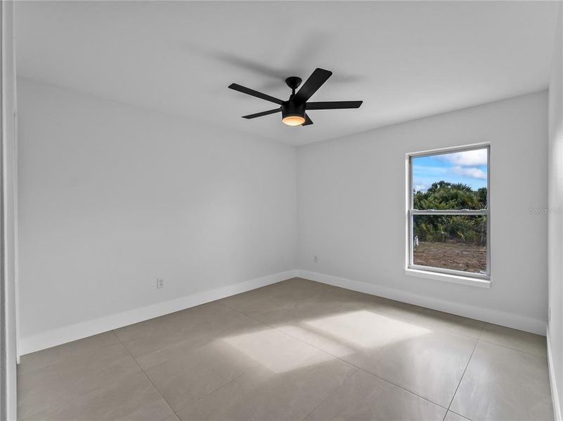 Spacious, unfurnished interior of a new home in , Port Charlotte (Image 20).
