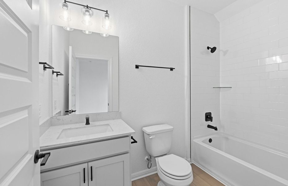 Furnished interior view inside a new home in West Cypress Hills, Spicewood (Image 12).