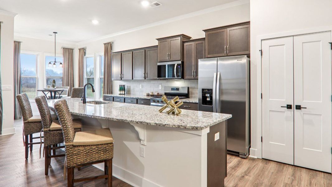 Furnished interior view inside a new home in Reserve at Tap Root Farms, Fletcher (Image 15).