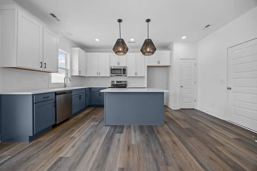 Representative furnished interior of a home built from the Blue Satin Sashes by Garman Homes in Spring Valley, Trinity (Image 4).