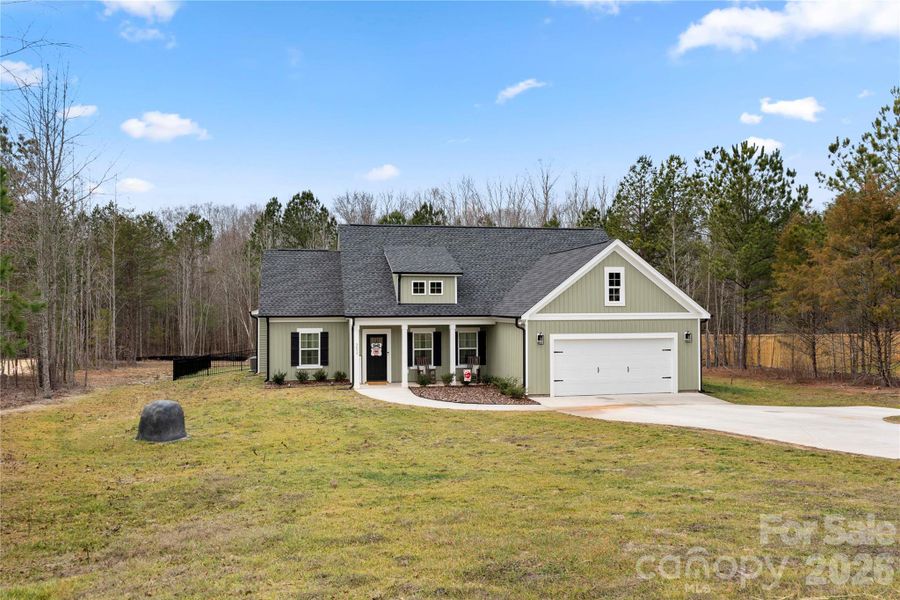 Front exterior of a new home in , Clover, SC, highlighting curb appeal (Image 1). Front exterior of a new home in , Clover, SC, highlighting curb appeal (Image 1).