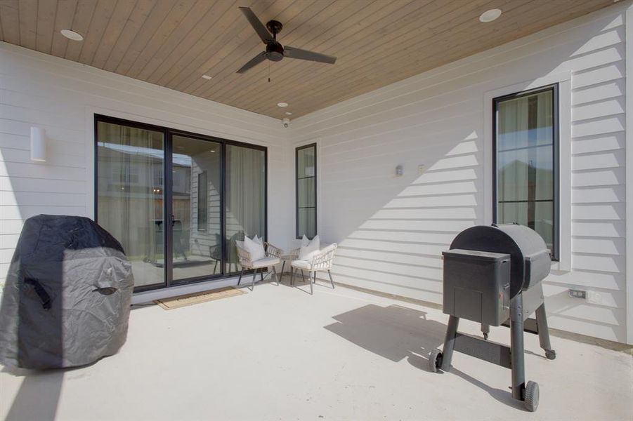 View of patio with ceiling fan