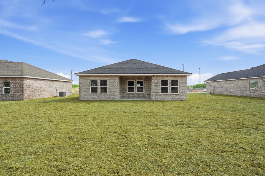 Exterior details and patio area of a home in Southern Charm, Crestview (Image 25).