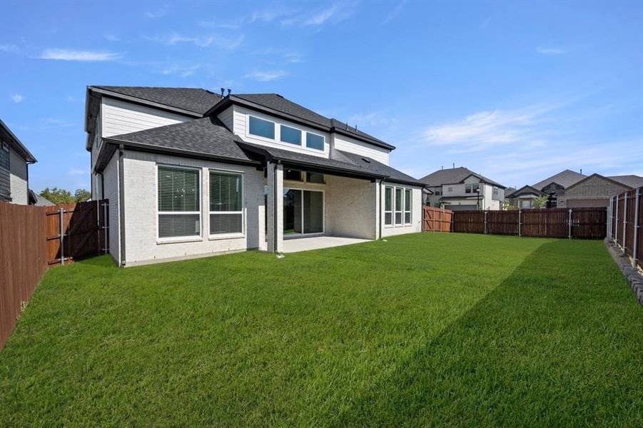 Exterior details and patio area of a home in Birdsong, Mansfield (Image 20).