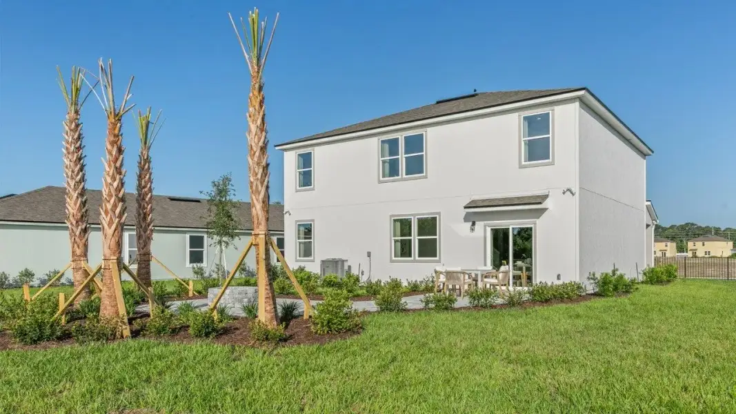 Exterior details and patio area of a home in The Arbors, Jacksonville (Image 2).